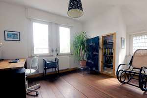 Gemütliche Dachgeschosswohnung mit Altbauflair und Südwestbalkon – vermietet & wertbeständig