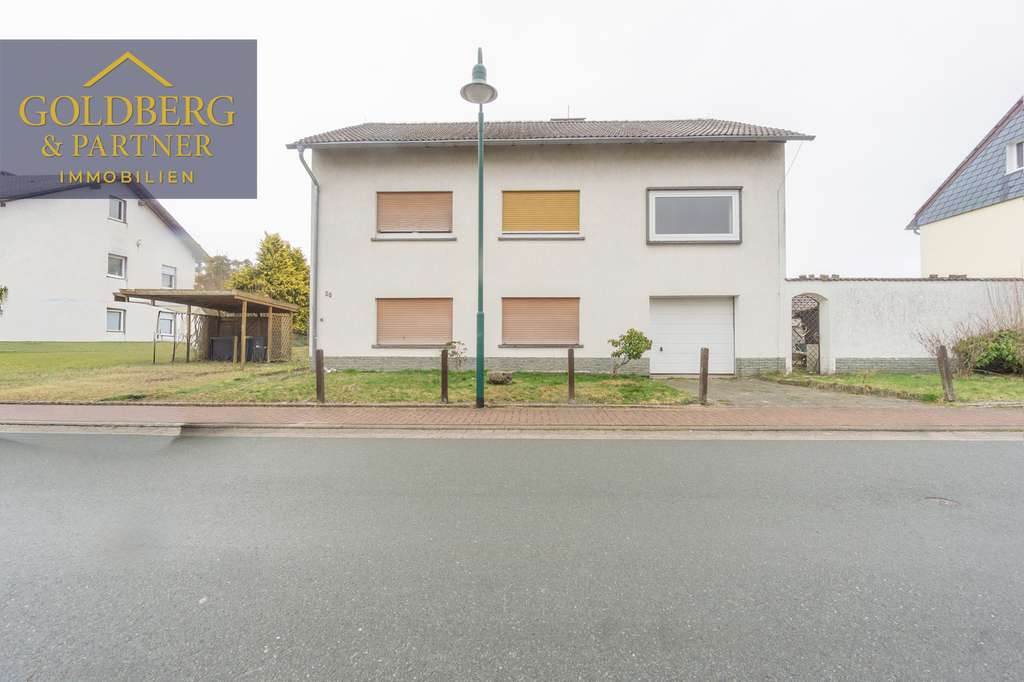 Immobilie in Burgwald - Modernisiertes Einfamilienhaus mit großem Garten, Balkon & viel Platz in ruhiger Lage von Burgwald
 - Bild 0