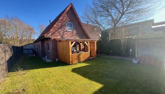 Bild von kleines Wohnhaus mit Garten und Carport in Westerstede