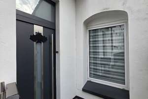 2‑Zimmer‑Wohnung mit Terrasse und separatem Eingang.