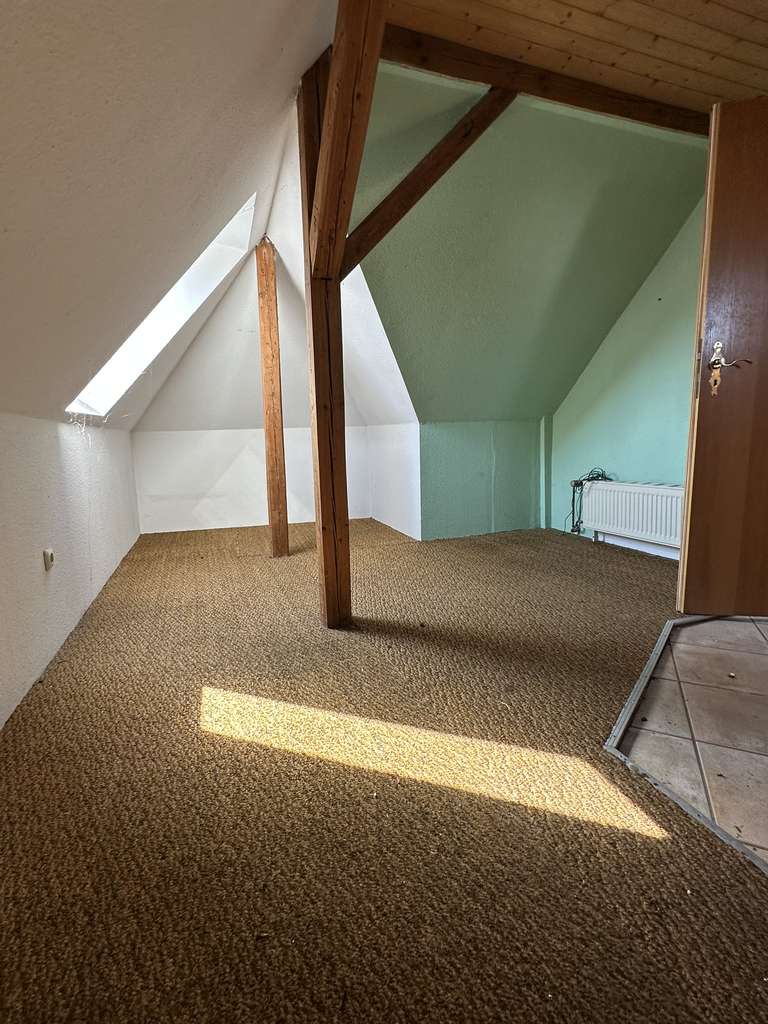 Immobilie in Lübz - Charmante 2-Zimmer-Dachgeschosswohnung in Lübz – Kapitalanlage oder Eigenheim - Bild 2