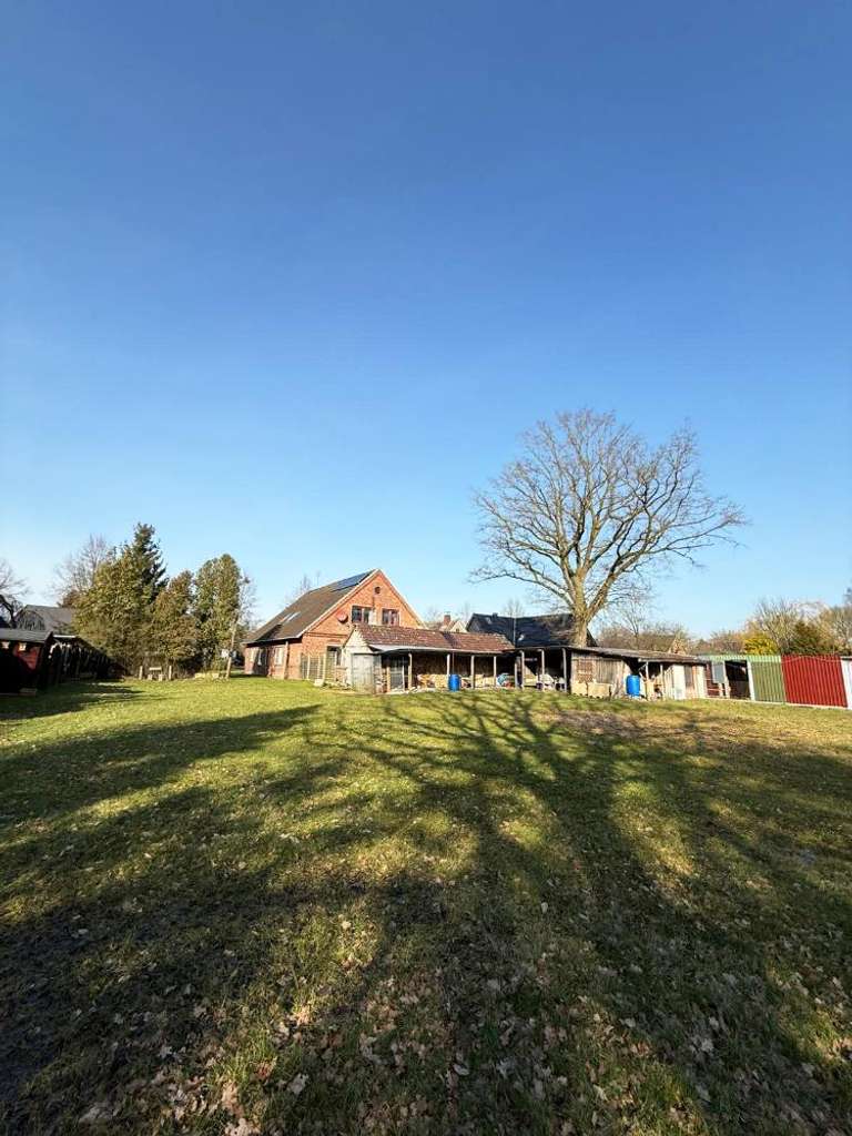 Immobilie in Loxstedt - Zweifamilienhaus mit PV-Anlage & großem Südgrundstück - Bild 2