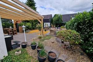 Exklusive Eigentumswohnung mit Garten und Stellplatz