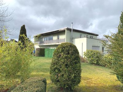 ATTRAKTIVE ANLAGE MIT VIEL POTENZIAL: Mehrfamilienhaus in Ortsteillage von Usingen