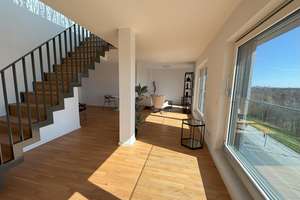 Lichtdurchflutetes Penthouse mit exklusiver Dachterrasse