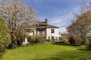 Ein Zuhause mit Seltenheitswert – Architektenhaus auf parkähnlichem Grundstück