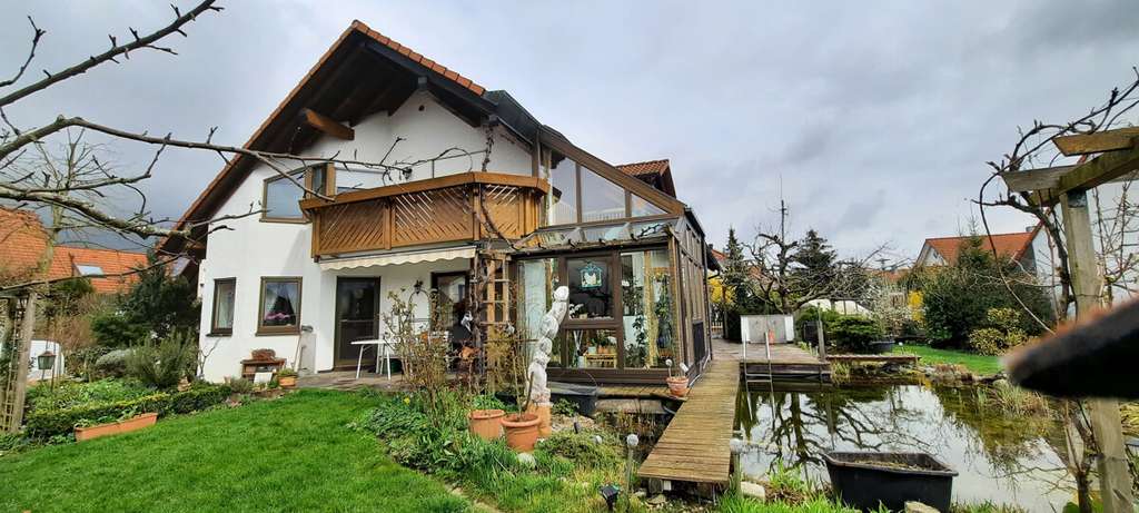 Immobilie in Hüttlingen - Exklusives Wohnjuwel mit Wintergarten, Wellness & Traumgarten in Hüttlingen - Bild 3