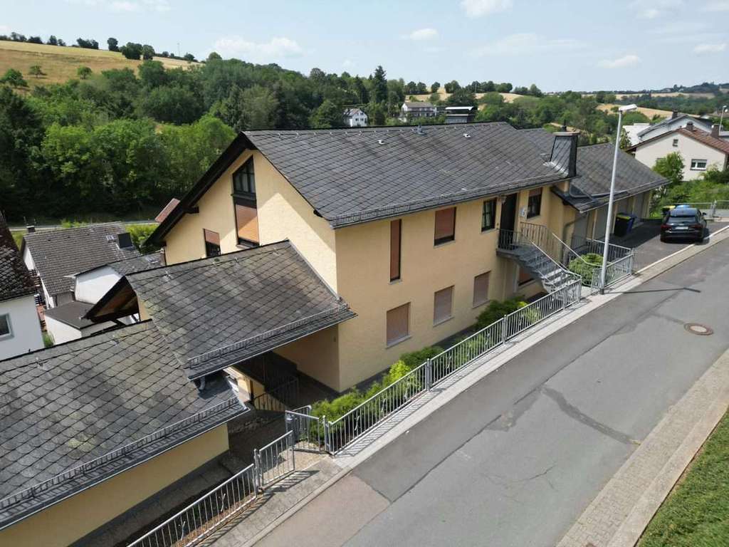Immobilie in Bad Schwalbach - Gepflegtes Mehrfamilienhaus in Ramschied mit 7 Stellplätzen (Garage) zu verkaufen! - Bild 4
