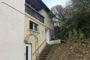 Einfamilienhaus mit Einliegerwohnung – Die vollständige Adresse der Immobilie erhältst du vom Anbieter., 55597 Wöllstein – Vorschaubild 2