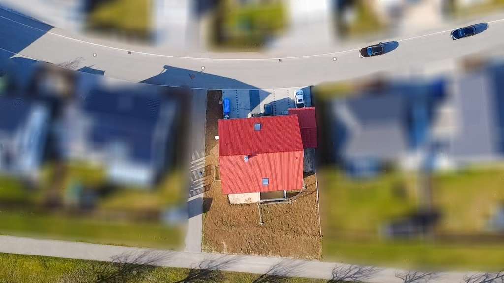 Immobilie in Mehrstetten - Neuwertiges 3-Familienhaus in Mehrstetten – modernes Wohnen auf der Schwäbischen Alb - Bild 2