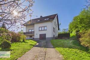 MERZIG: HAUS MIT EIN BIS ZWEI WOHNUNGEN / IDYLLISCH AM BACHLAUF / MIT CA. 33 AR GRUNDSTÜCK – Die vollständige Adresse der Immobilie erhältst du vom Anbieter., 66663 Merzig – Vorschaubild 1