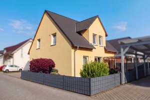Freistehendes Familienhaus mit 5 Zimmern, Garten und Garage in Münster (Hessen)