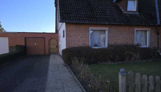 Bild von Ein Zuhause mit Potenzial – gemütliche Doppelhaushälfte mit schönem Garten