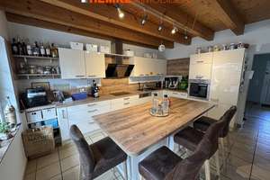 Schönes Einfamilienhaus mit sonniger Terrasse und separater Gewerbeeinheit