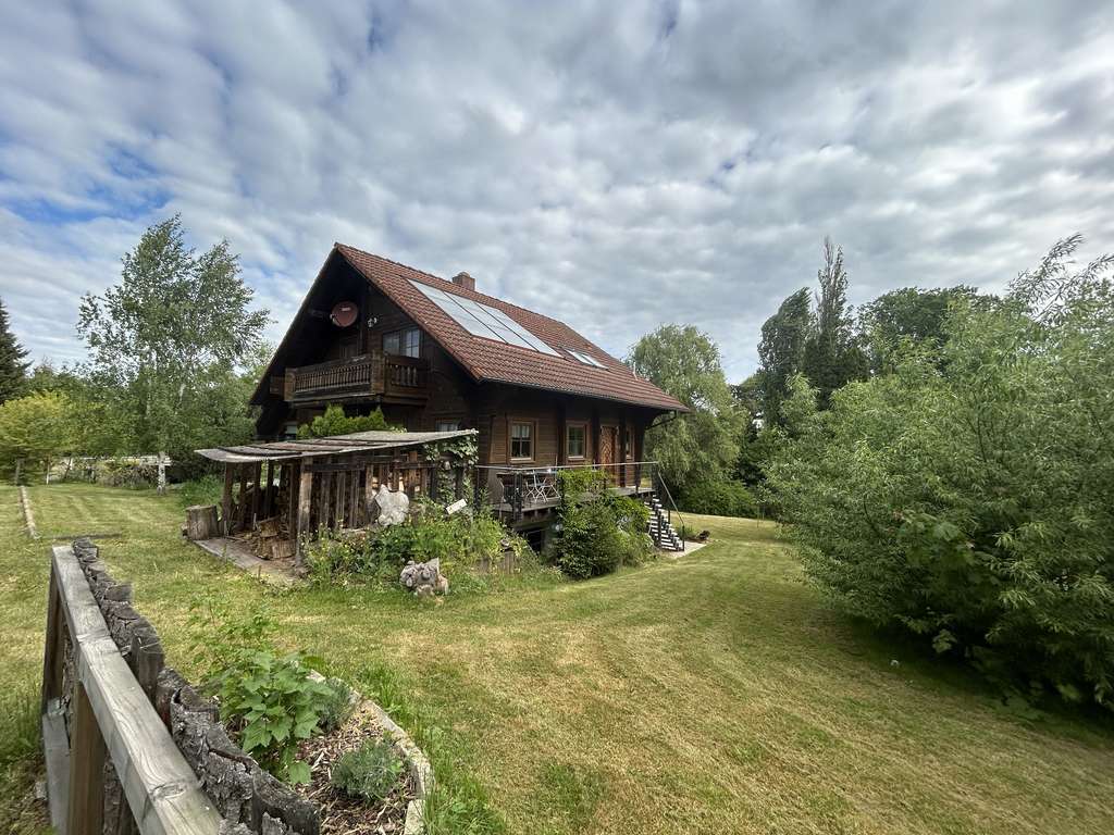 Wohnen im Holzhaus in Gutenborn mit Schwimmteich & Sauna