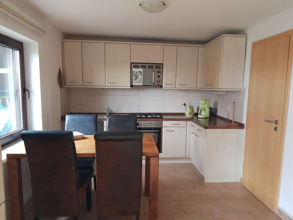 Immobilie in Alt Schwerin - Ferienhaus in Alt Schwerin (Eigentumsland)mit traumhaftem Seeblick am Plauer See - provisionsfrei  - Bild 1