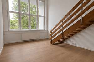 Stilvolle 2-Zimmer-Wohnung mit Möblierung im Erdgeschoss.