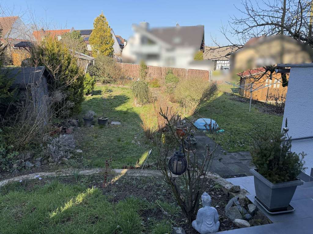 Immobilie in Roßdorf - Charmantes Zweifamilienhaus mit großem Grundstück in ruhiger und zentraler Lage von Roßdorf - Bild 4