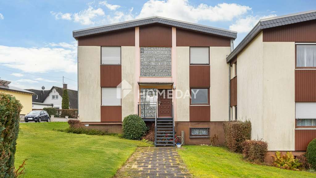 Immobilie in Hirzenhain - 2-Zimmer-Erdgeschosswohnung mit Südwestbalkon in ruhiger Lage von Hirzenhain - Bild 0