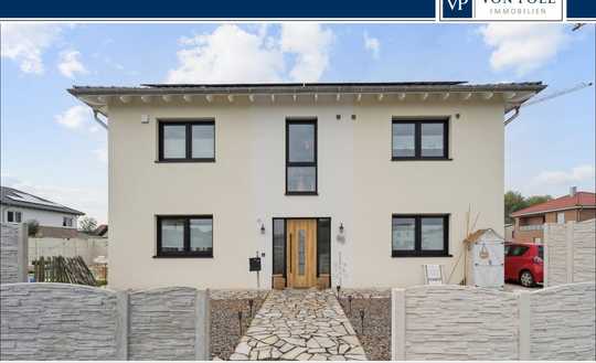 Attraktives Zweifamilienhaus in Olfen–modern, nachhaltig und mit KfW 40+ Standard