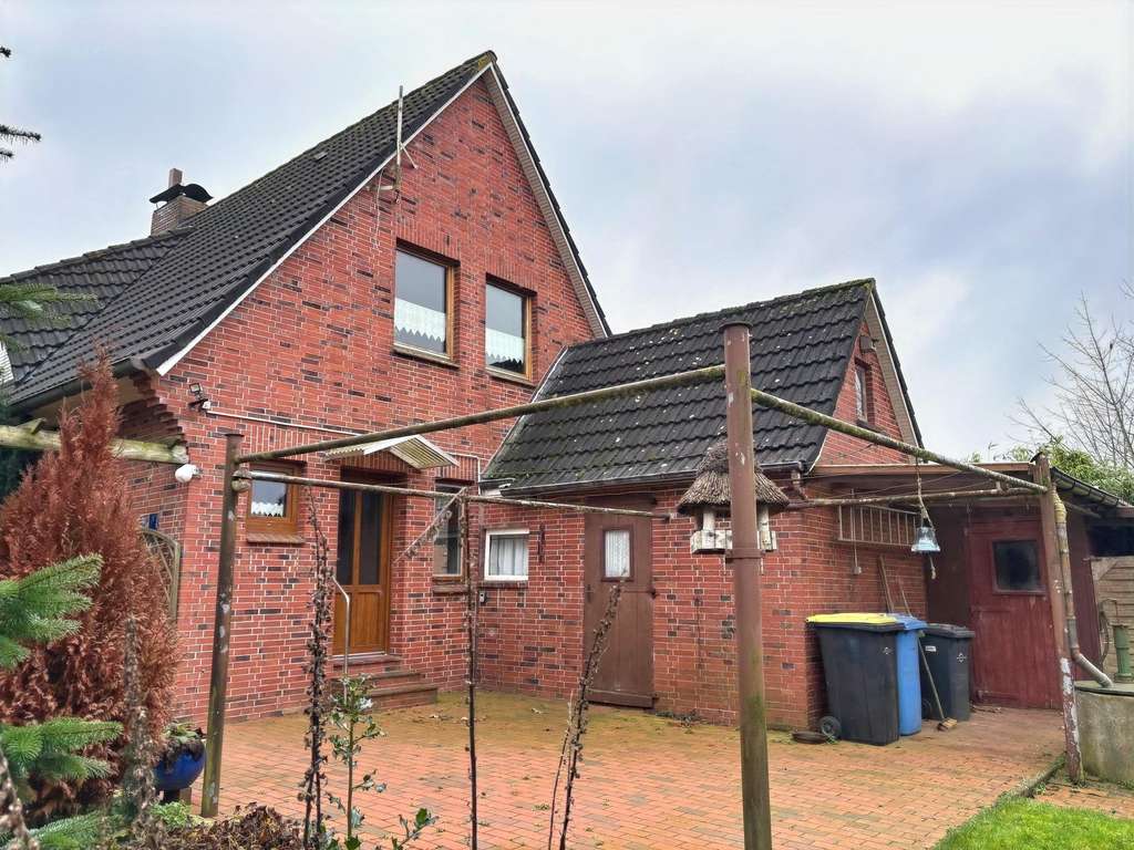 Immobilie in Hinte - Einfamilienhaus mit Garage in Sackgassenlage von Hinte-Loppersum - Bild 2