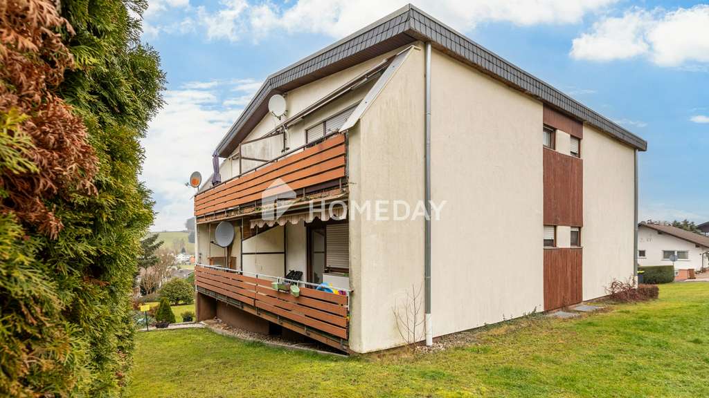 Immobilie in Hirzenhain - 2-Zimmer-Erdgeschosswohnung mit Südwestbalkon in ruhiger Lage von Hirzenhain - Bild 2