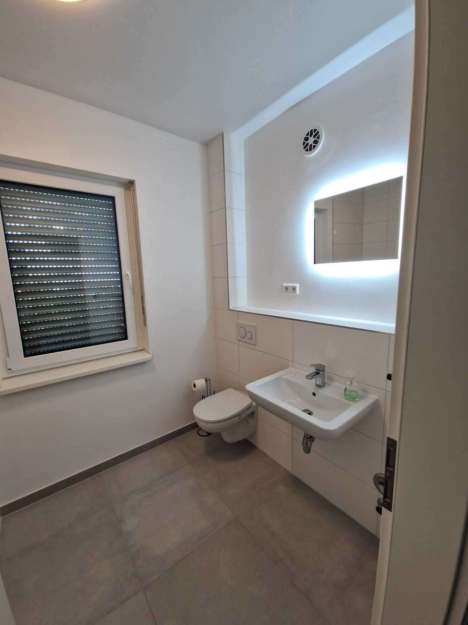 Immobilie in Modautal - Viele Nutzungsmöglichkeiten: energieeffizientes Zweifamilienhaus mit traumhaftem Ausblick  - Bild 11