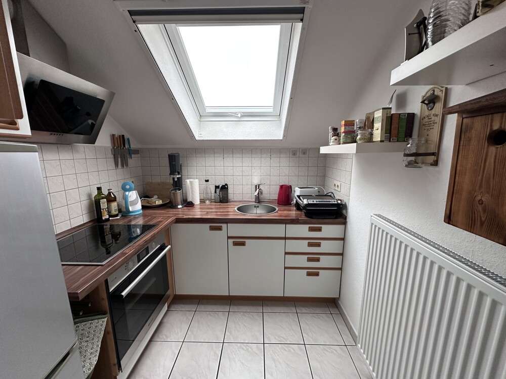 Immobilie in Obernburg am Main - Raumwunder ... Helle, gemütliche 2-Zimmer-Dachgeschosswohnung mit Balkon! - Bild 4