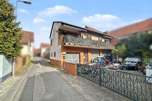 Vermietetes Einfamilienhaus mit großzügigen Garagen in Groß-Bieberau – attraktive Kapitalanlage – Die vollständige Adresse der Immobilie erhältst du vom Anbieter., 64401 Groß-Bieberau – Vorschaubild 3