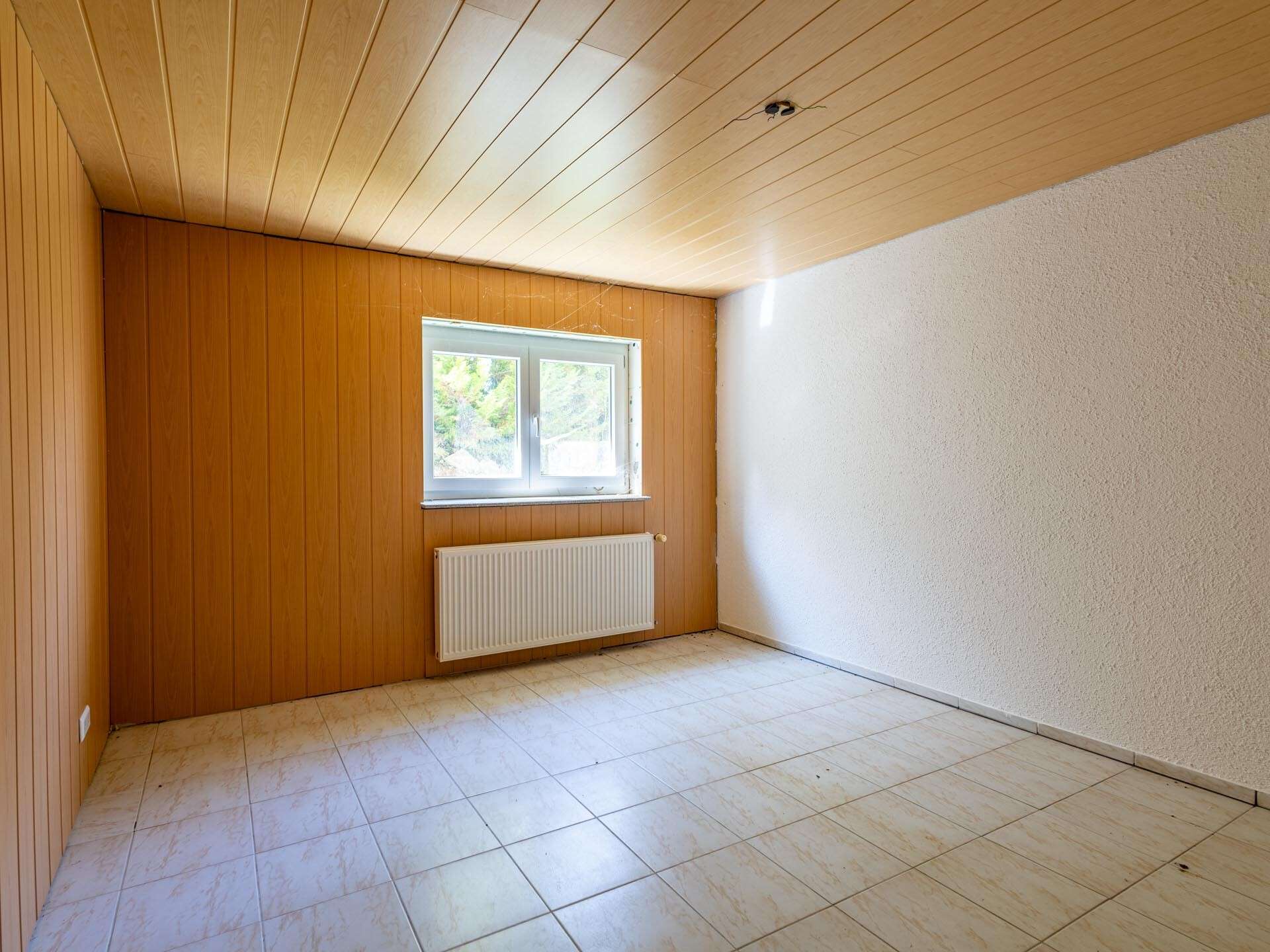 2-Zimmer-Souterrainwohnung mit großzügiger Terrasse und eigenem Stellplatz, Breisgau Hochschwarzwald Kreis – Bild 2