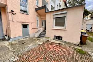 Geräumige EG-Wohnung mit EBK, kleinem Außenbereich und auf Wunsch Garage