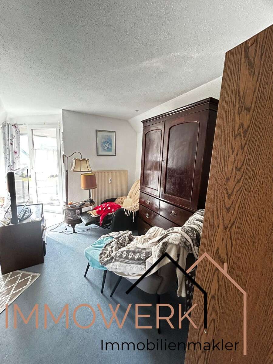 Immobilie in Luhden - Schön geschnittene, voll vermietete DG-Wohnung mit Balkon und Stellplatz. - Bild 3