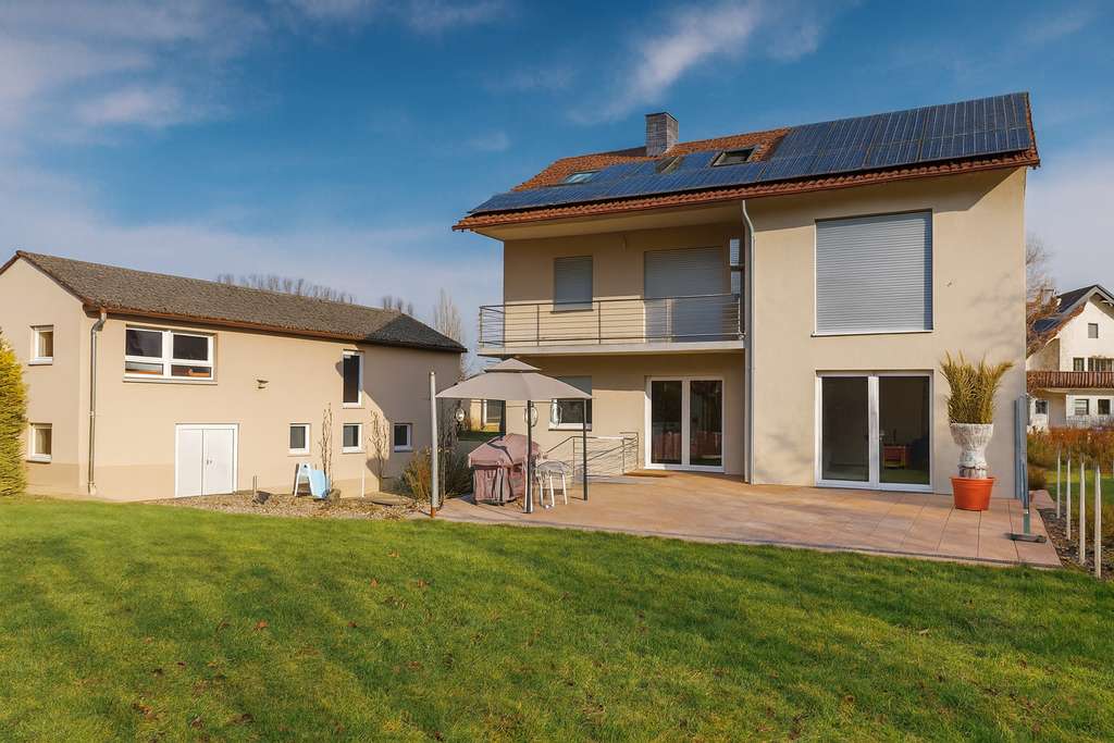 Immobilie in Flomborn - Modernes Einfamilienhaus mit Smart-Home, Heimkino, PV-Anlage und großem Grundstück - Bild 3