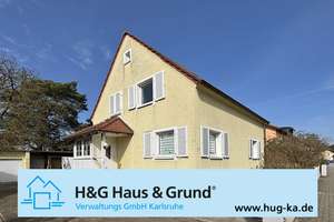 FREIWERDEND: Einfamilienhaus auf großem Grundstück und weiterer Bauplatz in Neureut-Kirc