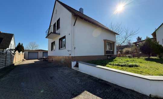 Einfamilienhaus / Baugrundstück mit Entwicklungspotenzial in ruhiger Lage