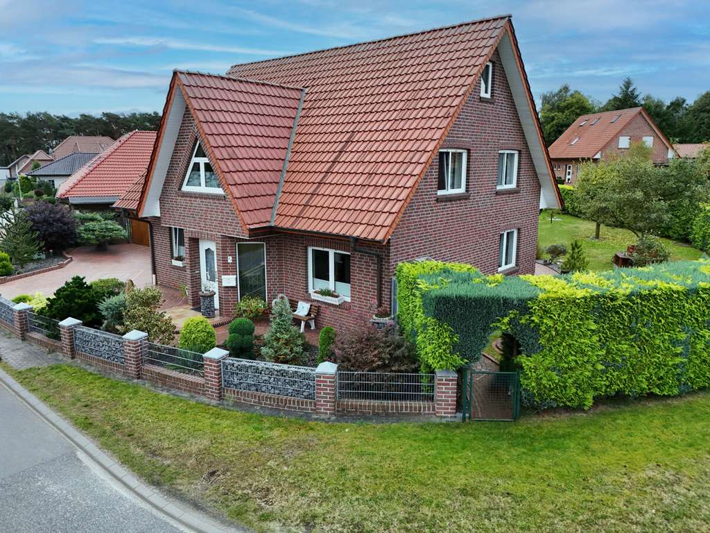 Immobilie in Börger - Einziehen und Wohlfühlen: Einfamilienhaus mit tollem Garten in ruhiger Wohnsiedlung! - Bild 1