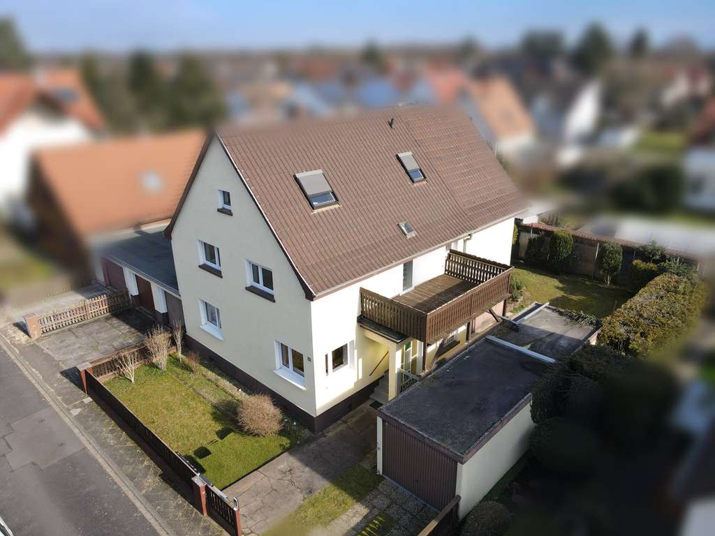 Immobilie in Mannheim - Attraktives Investment: Gepflegtes Haus mit 4 Einheiten, Garagen und Ausbaupotenzial - Bild 1