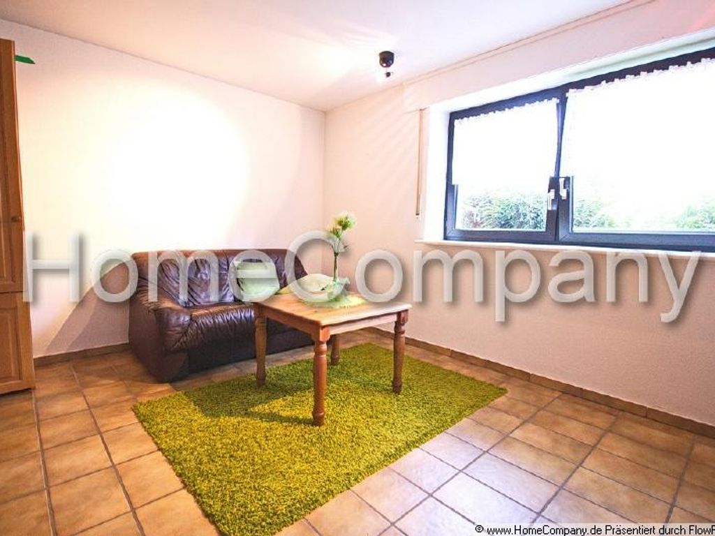 Souterainapartment mit kleiner Terrasse und ...