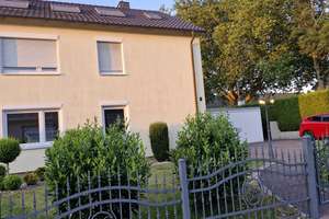 Erdgeschosswohnung mit Terrasse, Garten, Garage plus Stellplatz