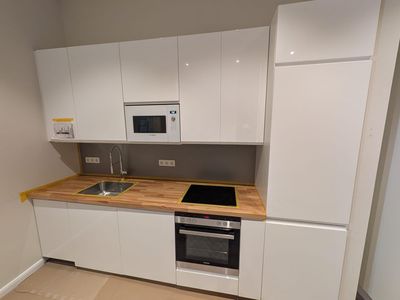 Erstbezug! Neue 2,5-Zi Wohnung in Toplage von Rüdesheim mit Einbauküche & Terrasse