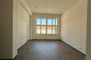 Wohnen mit Loftcharakter – 2 Zimmer, Terrasse und Aufzug