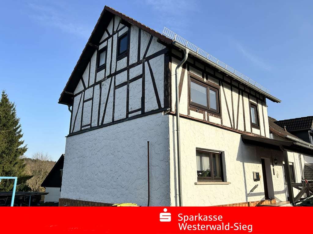 Immobilie in Bürdenbach - Nähe Horhausen, Doppelhaushälfte mit großem Grundstück sowie zusätzlichem Waldgrundstück - Bild 0