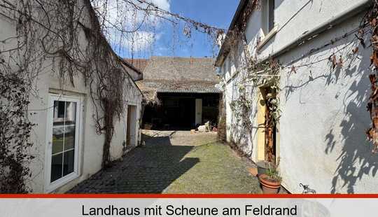 Bild von Landhaus mit Scheune am Feldrand