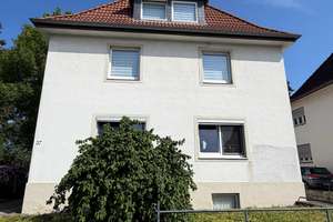 Drei auf einen Streich-Vermietetes MFH in Kliniknähe