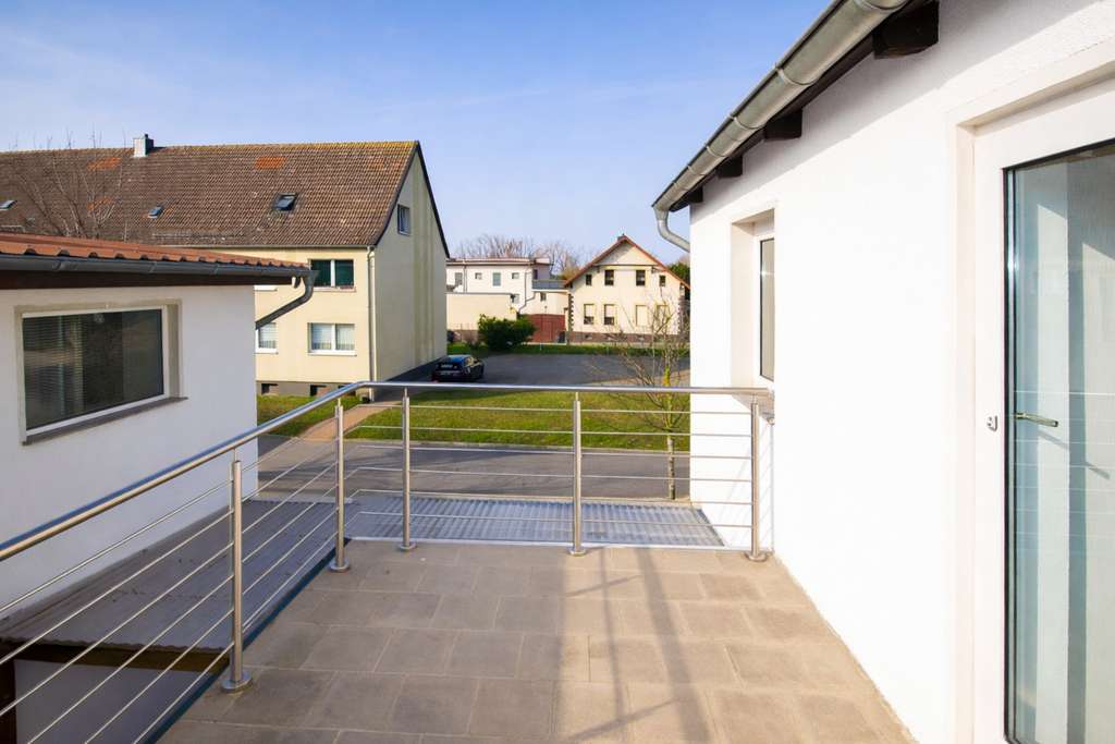 Immobilie in Kroppenstedt - Einfamilienhaus mit Balkon und vielseitiger Ladenfläche – Wohnen, Leben & Gestalten mit Perspektive - Bild 3