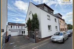 "Wohnen und Arbeiten in Koblenz-Lay: Wohnhaus mit Gewerbemöglichkeiten"