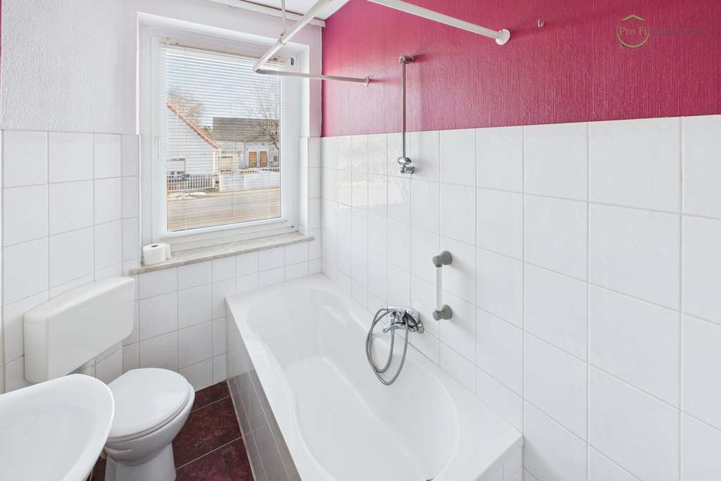 Immobilie in Hohenleipisch - Gepflegtes Mehrfamilienhaus mit 4 Wohneinheiten, Garagen und Ausbaupotenzial - Bild 4