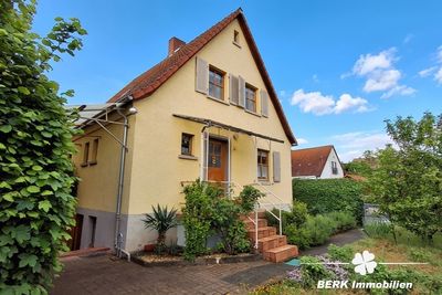 BERK Immobilien – Charmantes Einfamilienhaus mit idyllischem Garten in Wörth am Main