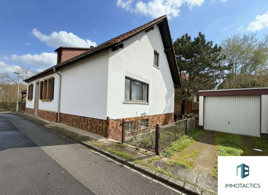 Immobilie in Odernheim am Glan - Freistehendes Einfamilienhaus mit Garage, Carport und Garten in Odernheim am Glan - Bild 0