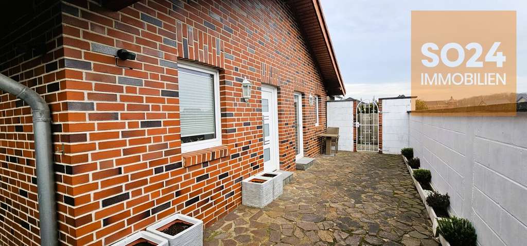 Immobilie in Inden - SO24 Inden Schophoven: Zwei Wohneinheiten,  Garagen, + Carport - Bild 0